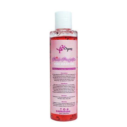A bottle of Purrfection Peach Yoni Wash with a pink label, 7.0 OZ size.