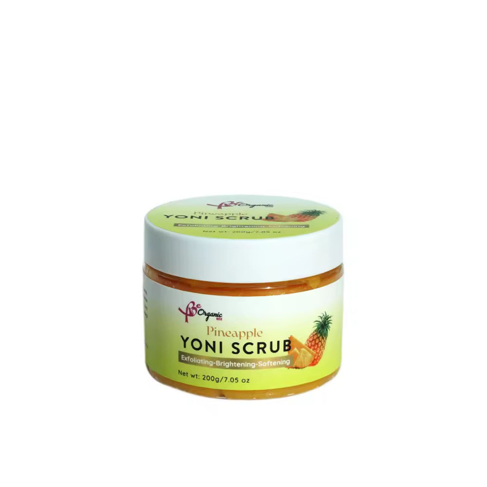 A jar of Pineapple Yoni Scrub with a label that includes a pineapple image and product details.